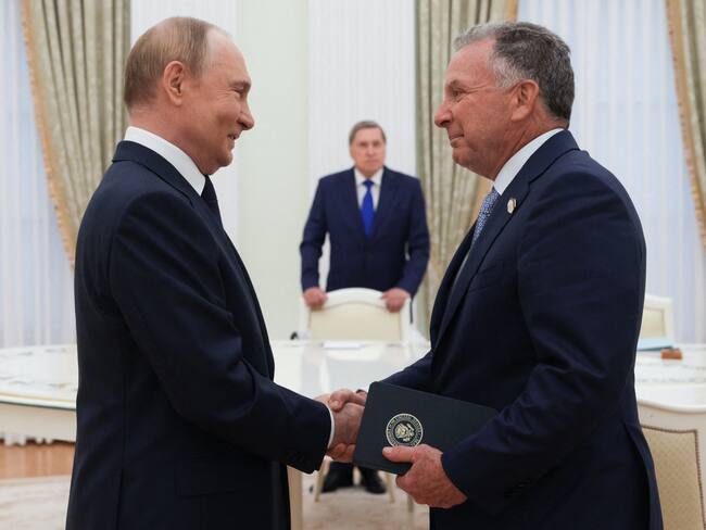 In this pool photograph distributed by the Russian state agency Sputnik, Russia's President Vladimir Putin greets US Special Envoy Steve Witkoff prior to their talks in Moscow on August 6, 2025. (Photo by Gavriil Grigorov / POOL / AFP)