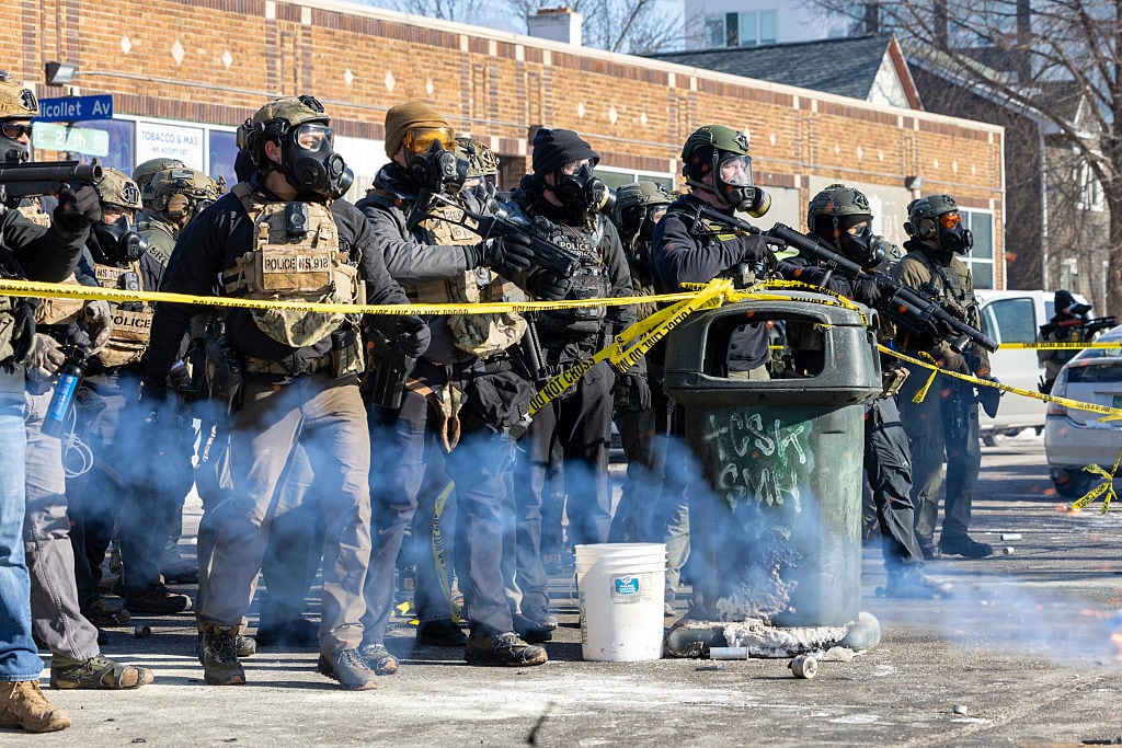 MINNEAPOLIS, UNITED STATES - JANUARY 24: Protesters clash with law enforcement after a federal agent shot and killed a man on Jan. 24 â" the second federal-involved shooting in the city this month, deepening tensions over enforcement operations in Minneapolis, United States, on January 24, 2026. (Photo by Arthur Maiorella/Anadolu via Getty Images)