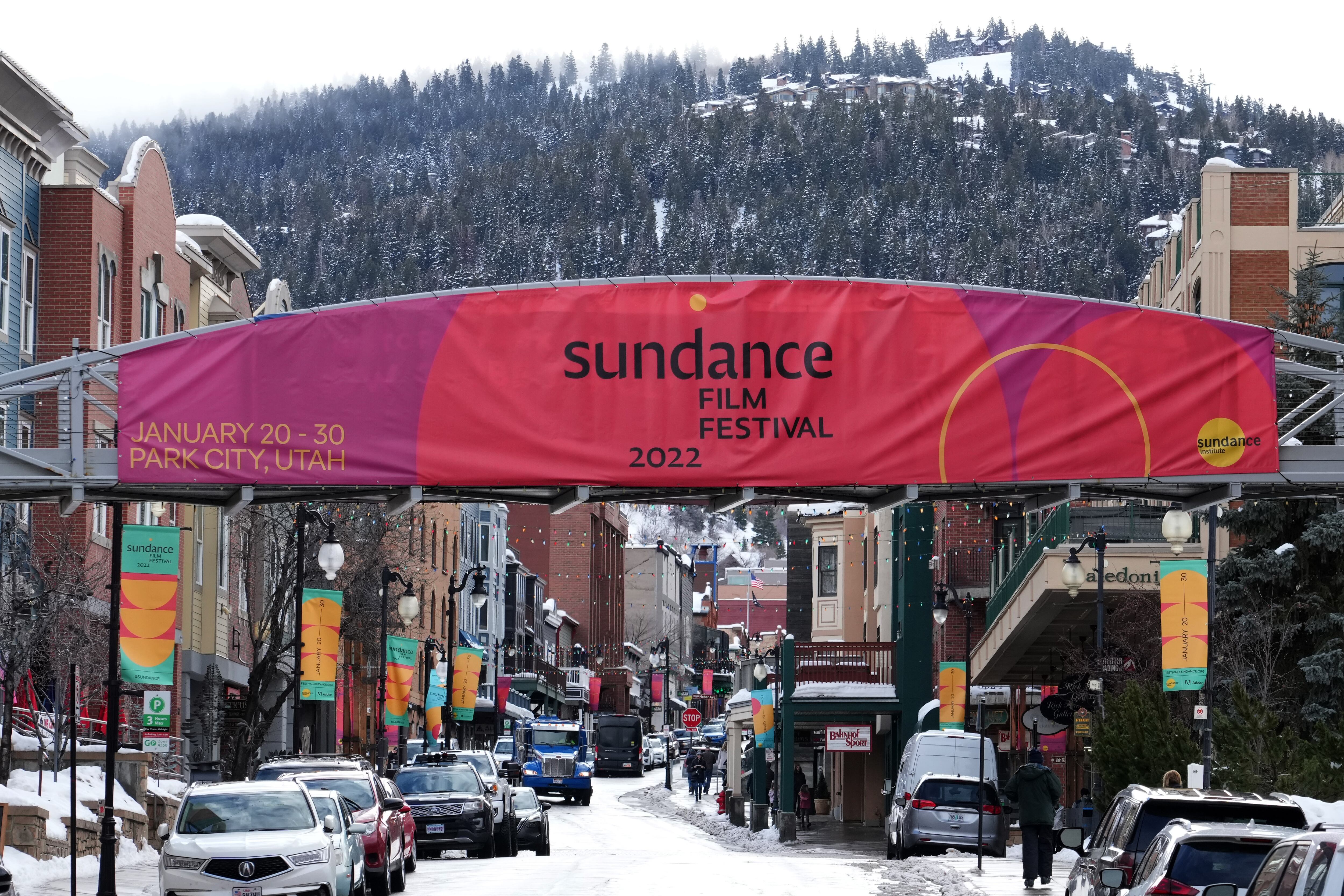 PARK CITY, UT - January 6: People and cars walk and drive up and down Old Main Street where filmgoers would have gathered for the 2022 Sundance Film Festival on January 6, 2022 in Park City, Utah. The 2022 Sundance Film Festival, which would have been held January 20-30 in Park City, has canceled in-person events and gone virtual due to a rise in Coronavirus cases caused by the omicron variant.  (Photo by George Frey/Getty Images)