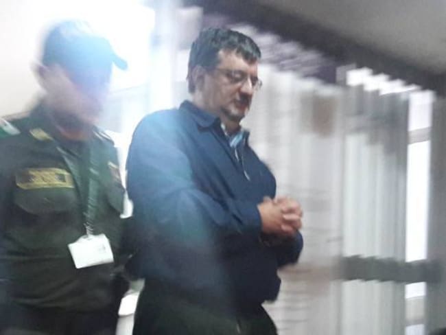 Jaime Gutiérrez Ángel cuando era trasladado del edificio de la Judicatura en Manizales hacia la Cárcel la Blanca. 