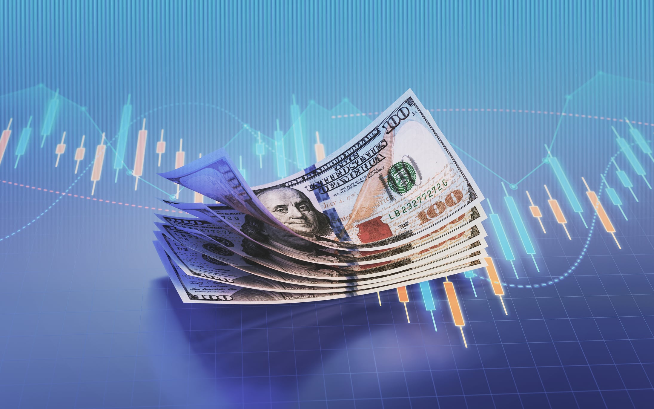 Fajo de dólares sobre una gráfica digital (Getty Images)