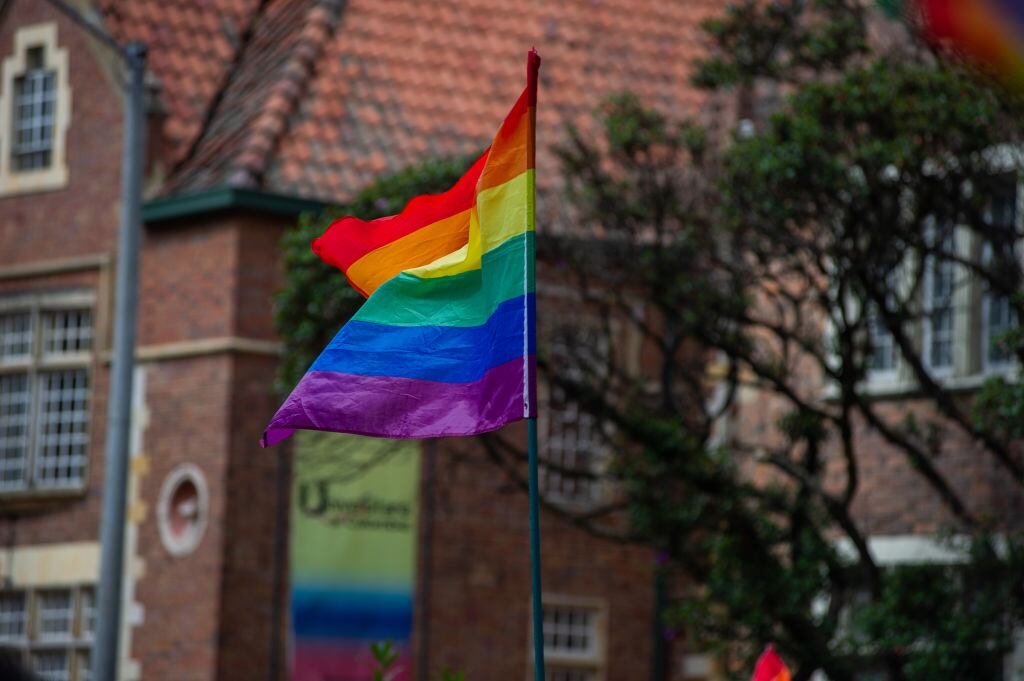 Demonstrators wave the Pride flag during the international pride day celebrations and protests in Bogota, Colombia, on July 4, 2021. (Photo by Sebastian Barros/NurPhoto via Getty Images)