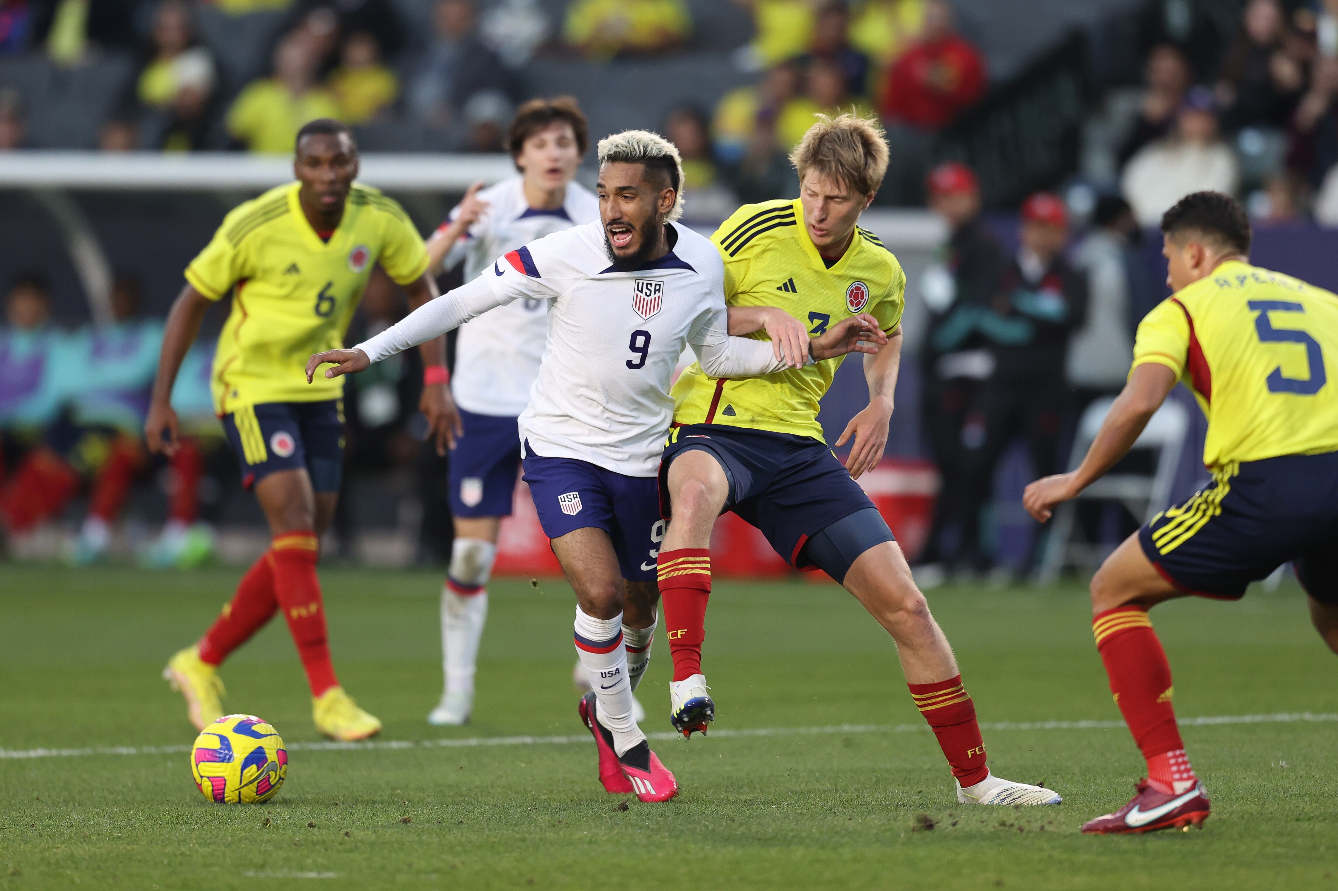 CARSON, CA - JANUARY 28:  Jesús Ferreira #9 of United States and Andrés Llinás #3 of Colombia battle for the ball during the international friendly match between United States and Colombia at Dignity Health Sports Park on January 28, 2023 in Carson, California. (Photo by Omar Vega/Getty Images)