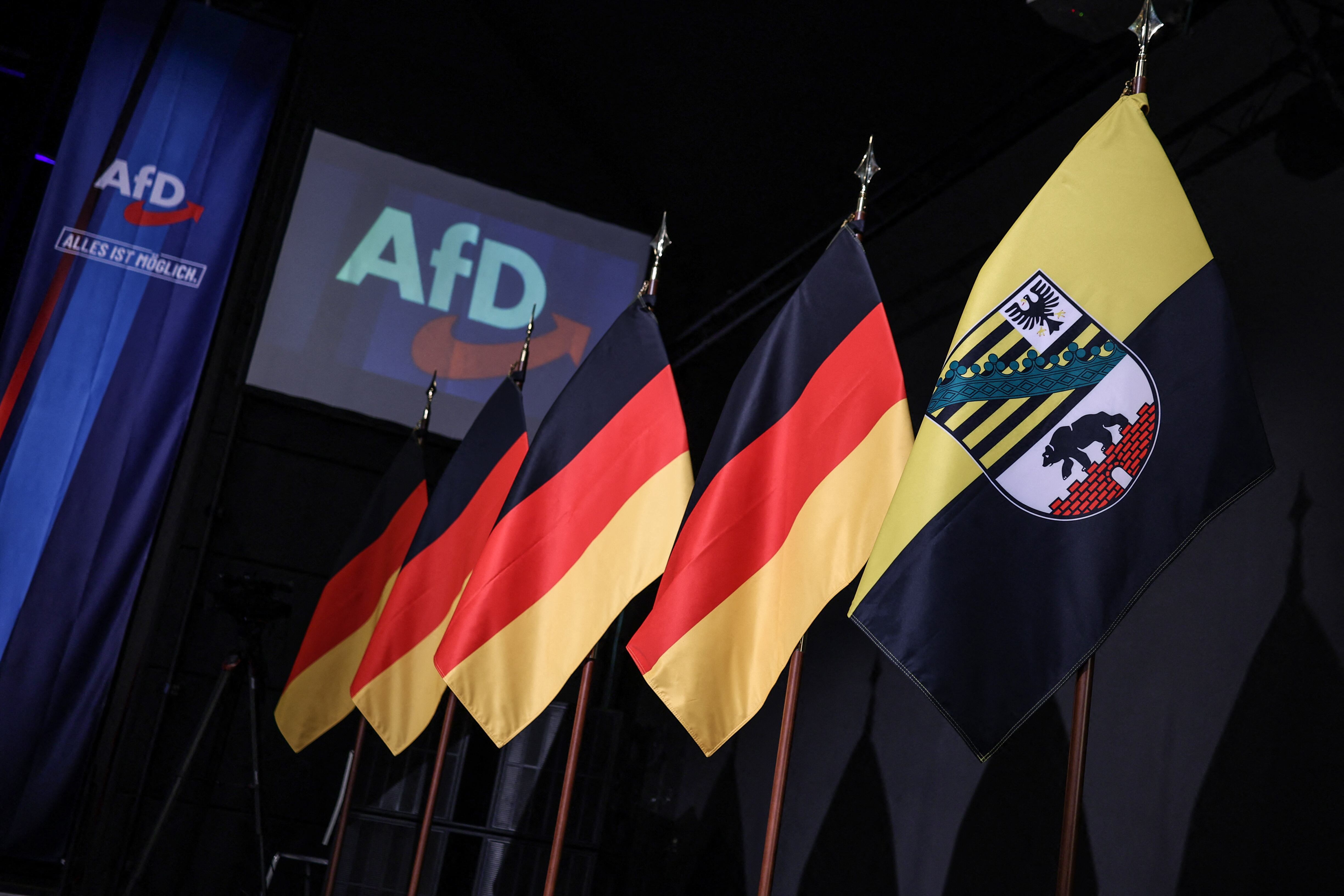 German Flags are lined up at the venue of the AfD's election party during Saxony-Anhalt's state elections in Magdeburg, eastern Germany on September 6, 2026. (Photo by Ronny HARTMANN / AFP)