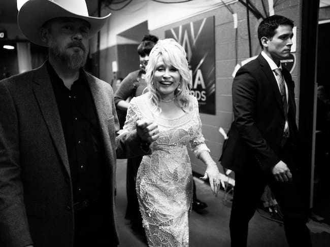 NASHVILLE, TENNESSEE - NOVEMBER 13: (FOR EDITORIAL USE ONLY) (EDITORS NOTE: Image has been converted to black and white.) Dolly Parton backstage at the 53rd annual CMA Awards at Bridgestone Arena on November 13, 2019 in Nashville, Tennessee. (Photo by Robby Klein/Getty Images for CMA)
