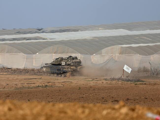Undisclosed (Israel), 02/12/2023.- An Israeli armoured fighting vehicle maneuvers at a position near the border with the Gaza Strip, in southern Israel, 02 December 2023. The IDF announced on 02 December they struck over 400 targets throughout the Gaza Strip over the past day, adding that Israeli Air Force (IAF) fighter jets struck over 50 targets in the Khan Yunis area overnight. Israeli forces hit targets in the Gaza Strip after a week-long truce expired on 01 December. More than 15,000 Palestinians and at least 1,200 Israelis have been killed, according to the Gaza Government media office and the Israel Defense Forces (IDF), since Hamas militants launched an attack against Israel from the Gaza Strip on 07 October, and the Israeli operations in Gaza and the West Bank which followed it. EFE/EPA/ATEF SAFADI
