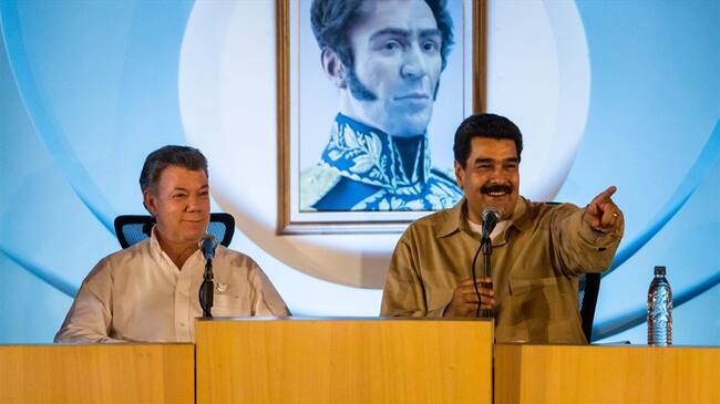 Juan Manuel Santos y Nicolás Maduro. Foto: Agencia EFE