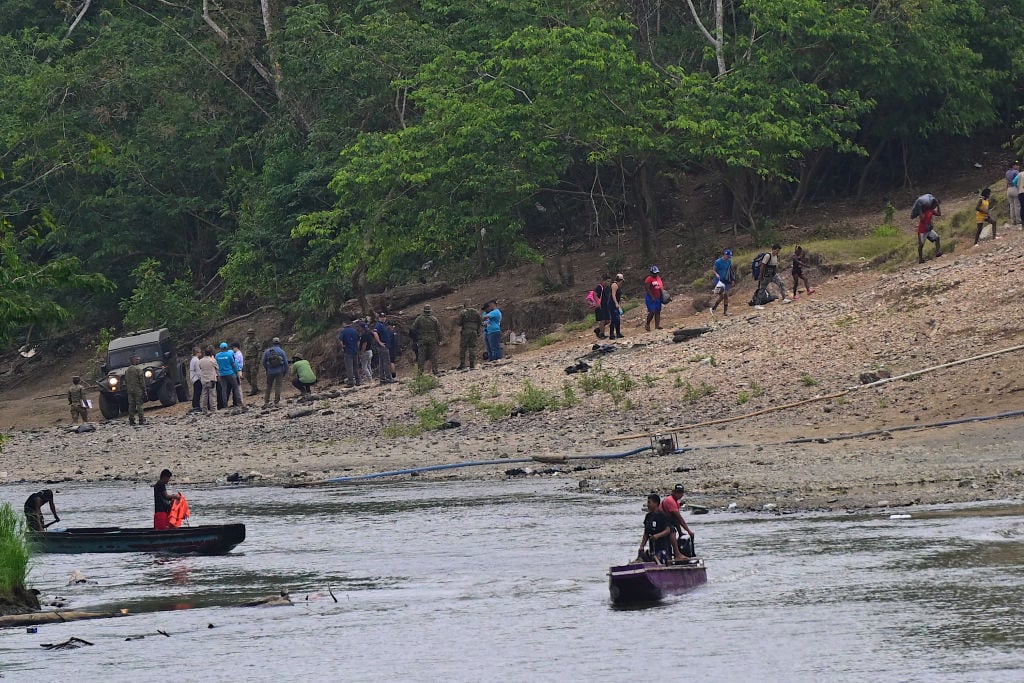 Migrants arrive at the Migrant Reception Station in Lajas Blancas, Darien Province, Panama, on March 11, 2024. The United States donated half a million dollars worth of tents, cots, and other equipment on Monday to assist migrants crossing the Panamanian jungle, following the departure of the NGO Médecins Sans Frontières (MSF). (Photo by MARTIN BERNETTI / AFP) (Photo by MARTIN BERNETTI/Afp/AFP via Getty Images)