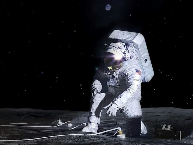 Concepto artístico de un astronauta de Artemis desplegando un instrumento en la superficie lunar.NASA - EP