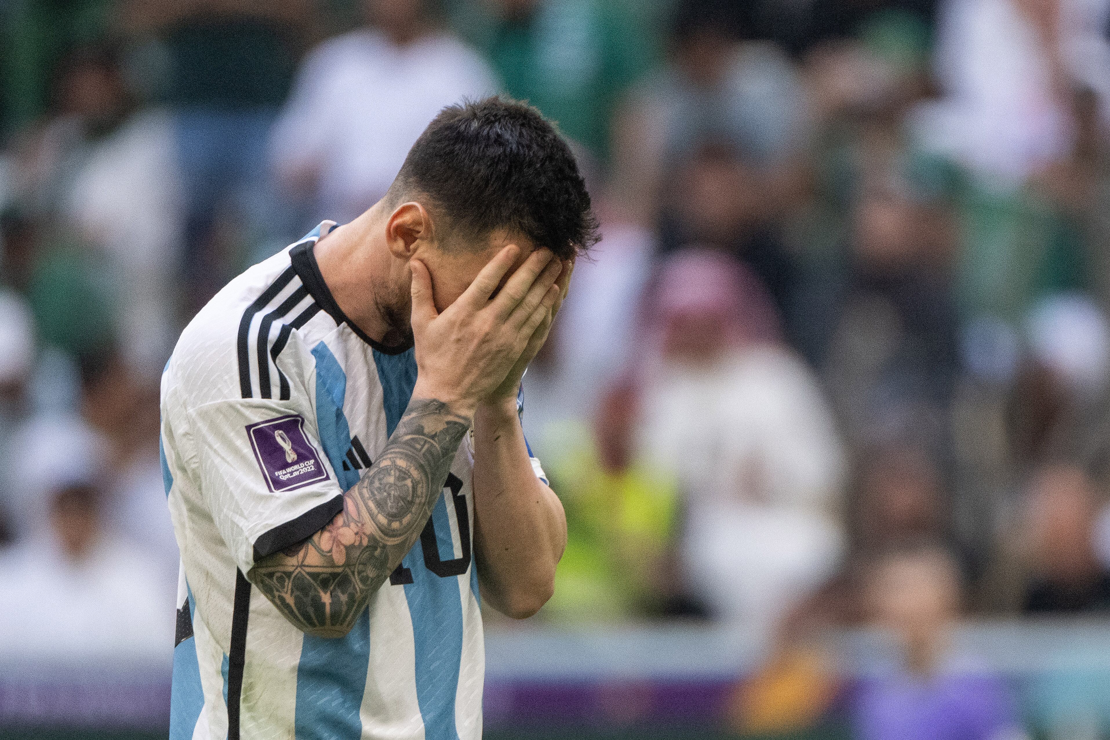 LUSAIL CITY, QATAR - NOVEMBER 22: Lionel Messi of Argentina reacts during the FIFA World Cup Qatar 2022 Group C match between Argentina and Saudi Arabia at Lusail Stadium on November 22, 2022 in Lusail City, Qatar. (Photo by Lionel Hahn/Getty Images)