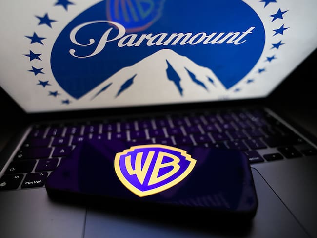 Paramount logo displayed on a laptop screen and Warner Bros logo displayed on a phone screen are seen in this illustration photo taken in Krakow, Poland on February 28, 2026. (Photo by Jakub Porzycki/NurPhoto via Getty Images)