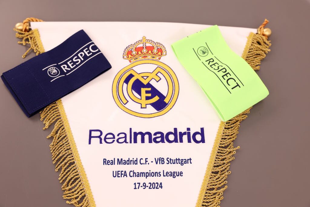 MADRID, SPAIN - SEPTEMBER 17: A detailed view of the match pennant and the UEFA Respect Captains armbands, inside the Real Madrid dressing room prior to the UEFA Champions League 2024/25 League Phase MD1 match between Real Madrid CF and VfB Stuttgart at Estadio Santiago Bernabeu on September 17, 2024 in Madrid, Spain. (Photo by Gonzalo Arroyo - UEFA/UEFA via Getty Images)