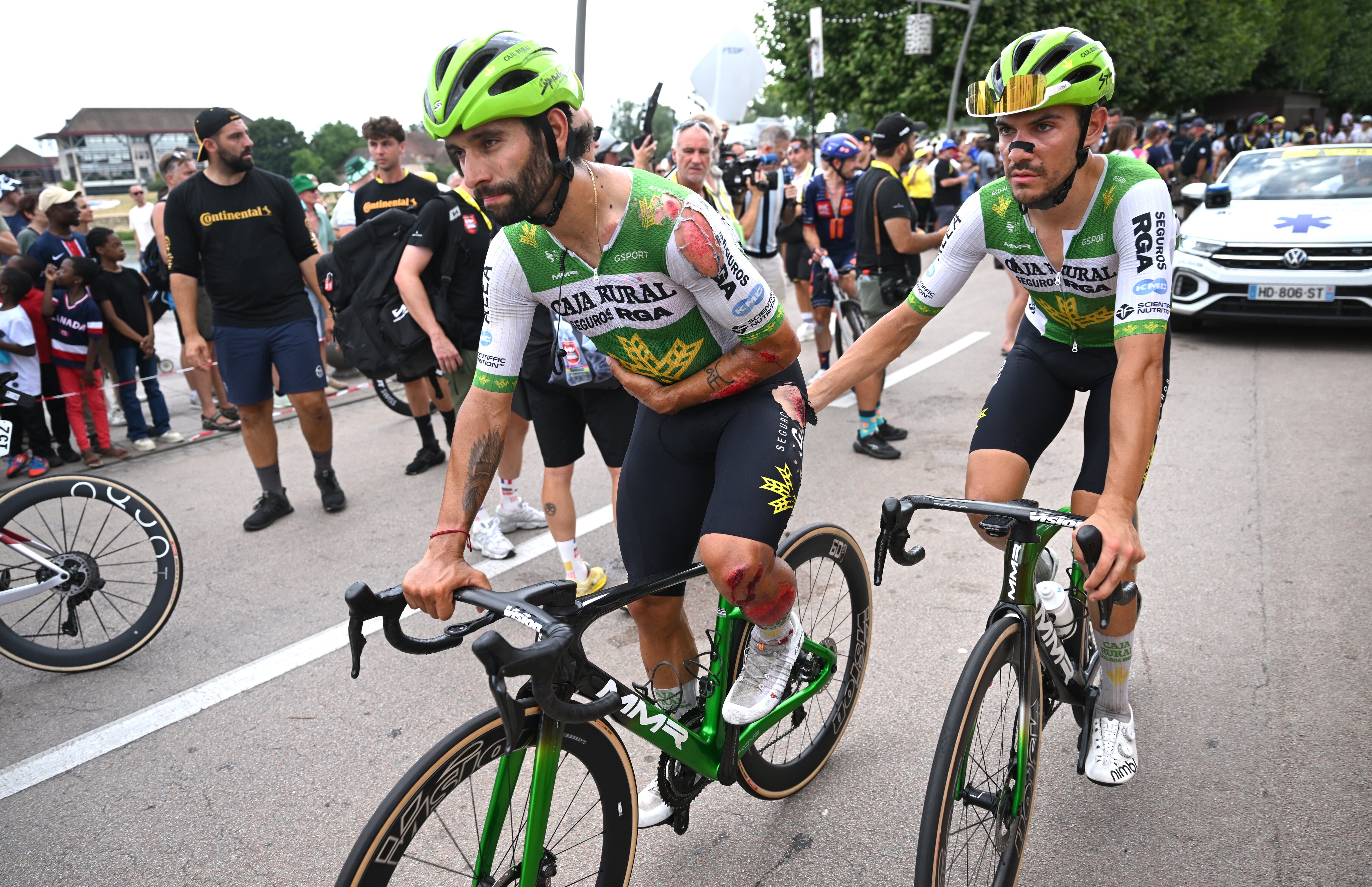 CHALON-SUR-SAONE, FRANCE - JULY 16: (L-R) Fernando Gaviria of Colombia injured after with his teammate Stefano Oldani of Italy and Team Caja Rural - Seguros RGA during the 113th Tour de France 2026, Stage 12 a 179.1km stage from Circuit Nevers Magny-Cours to Chalon-sur-Saone / #UCIWT / on July 16, 2026 in Chalon-sur-Saone, France.  (Photo by Dario Belingheri/Getty Images)
