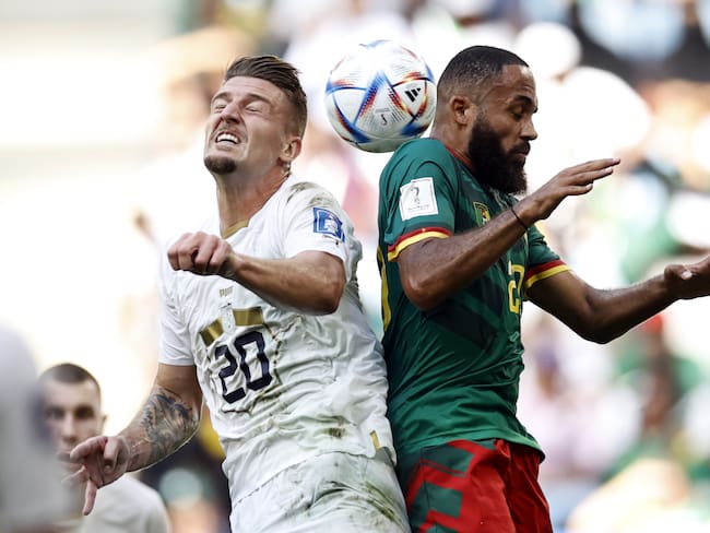 AL WAKRAH - (l-r) Sergej Milinkovic-Savic of Serbia, Bryan Mbeumo of Cameroon during the FIFA World Cup Qatar 2022 group G match between Cameroon and Serbia at Al Janoub Stadium on November 28, 2022 in Al Wakrah, Qatar. AP | Dutch Height | MAURICE OF STONE (Photo by ANP via Getty Images)