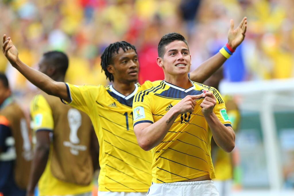 Juan Cuadrado y James Rodríguez en el Mundial 2014 / Getty Images