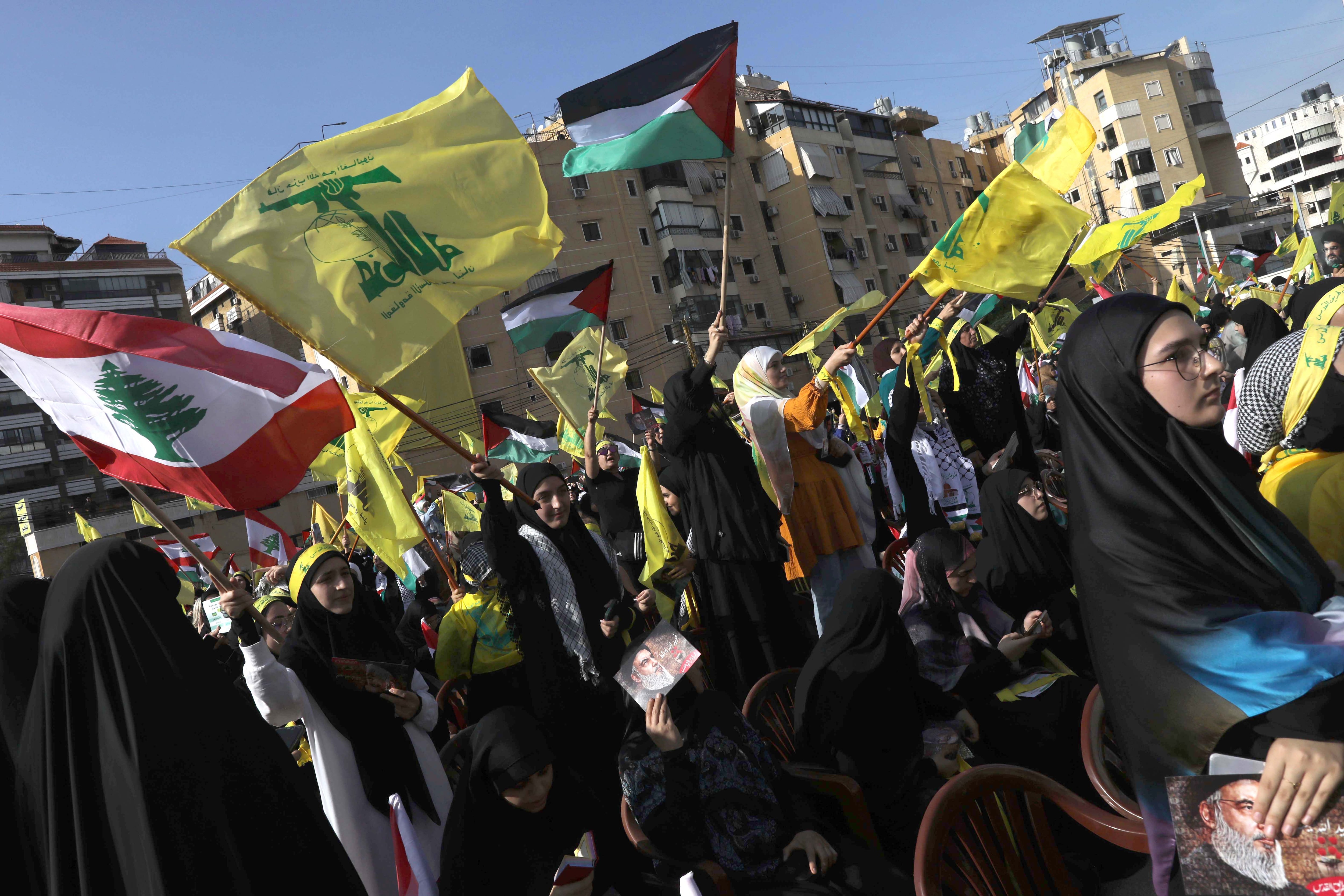BEIRUT, LEBANON - NOVEMBER 3: Supporters of Hezbollah gather at al-Ashoura square in southern suburbs of Beirut to listen to the speech of the Secretary-general of Hezbollah Hassan Nasrallah on November 3, 2023 in Beirut, Lebanon. The Secretary General of Hezbollah, Hassan Nasrallah, will speak today for the first time since Israeli's attack on Gaza after the Oct 7 Hamas attacks. (Photo by Marwan Tahtah/Getty Images)