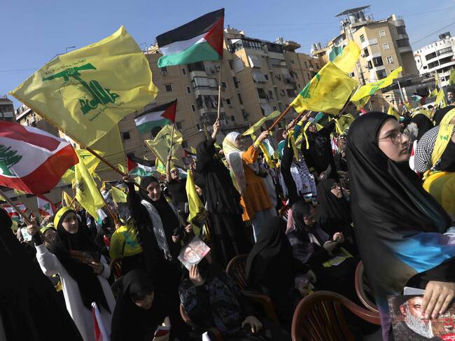 BEIRUT, LEBANON - NOVEMBER 3: Supporters of Hezbollah gather at al-Ashoura square in southern suburbs of Beirut to listen to the speech of the Secretary-general of Hezbollah Hassan Nasrallah on November 3, 2023 in Beirut, Lebanon. The Secretary General of Hezbollah, Hassan Nasrallah, will speak today for the first time since Israeli's attack on Gaza after the Oct 7 Hamas attacks. (Photo by Marwan Tahtah/Getty Images)