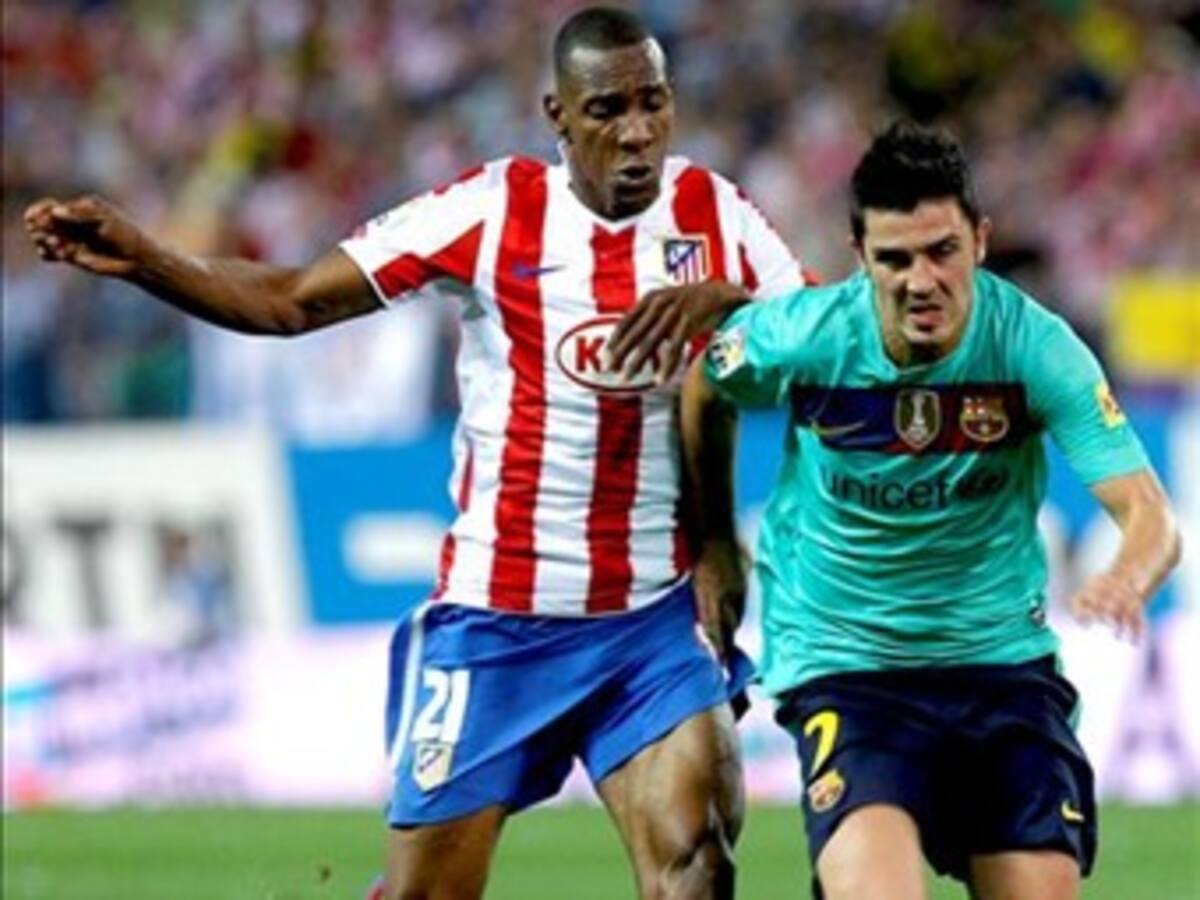 El Barça rompe su mala racha en el Calderón y el Valencia es el nuevo líder
