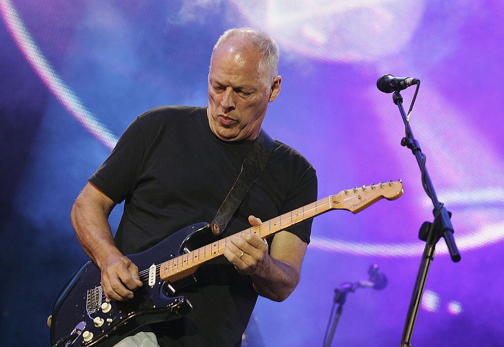 LONDON - JULY 02:  Dave Gilmour from the band Pink Floyd on stage at "Live 8 London" in Hyde Park on July 2, 2005 in London, England.  The free concert is one of ten simultaneous international gigs including Philadelphia, Berlin, Rome, Paris, Barrie, Tokyo, Cornwall, Moscow and Johannesburg. The concerts precede the G8 summit (July 6-8) to raising awareness for MAKEpovertyHISTORY.  (Photo by MJ Kim/Getty Images)