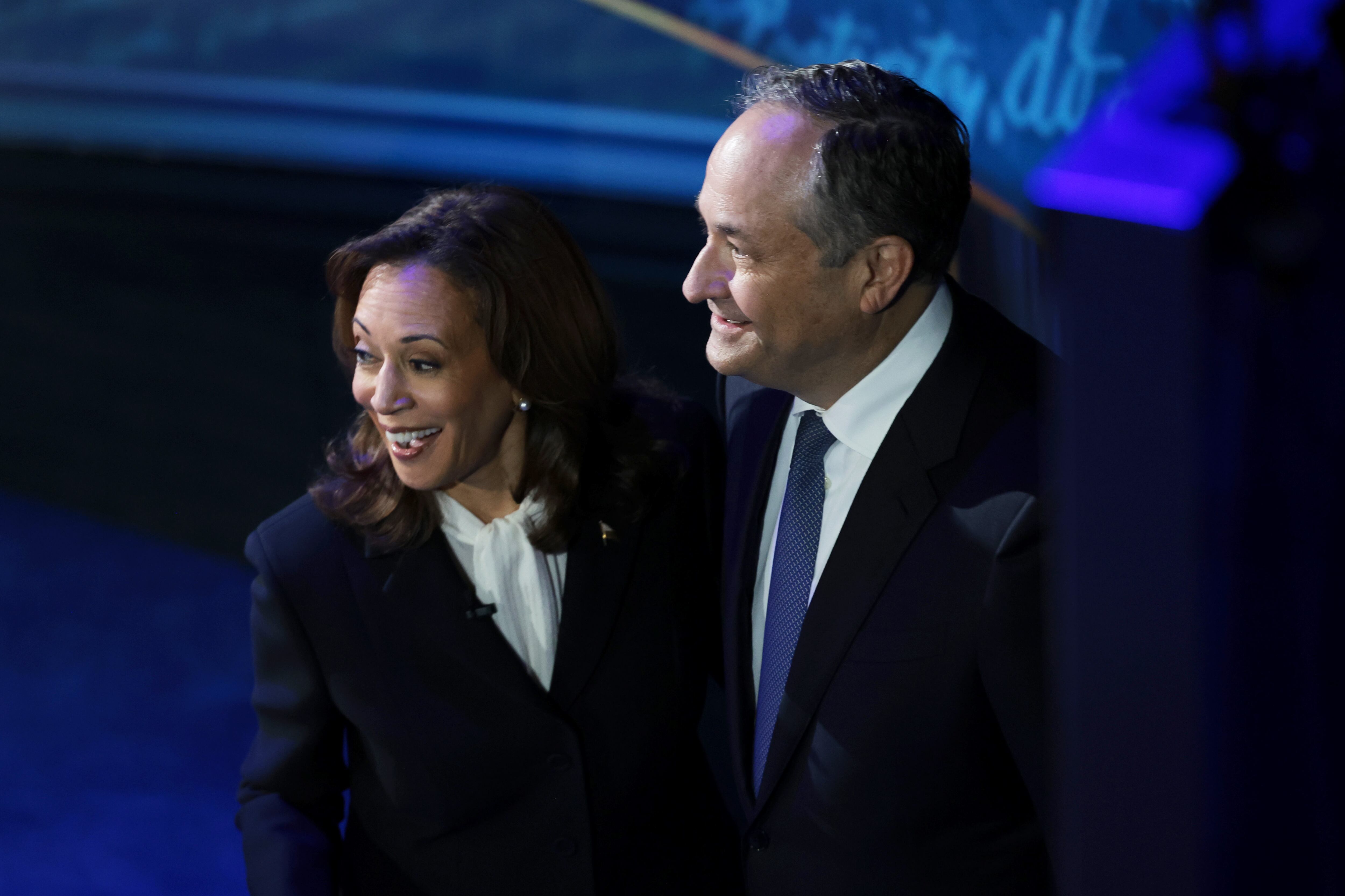 Democratic presidential nominee, U.S. Vice President Kamala Harris, embraces her husband Doug Emhoff after debating Republican presidential