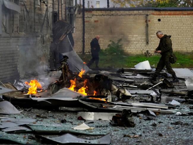 A view shows the site of a car bomb explosion outside a building housing a local TV station in the Russian-held city of Melitopol in southern Ukraine on October 25, 2022. (Photo by STRINGER / AFP) (Photo by STRINGER/AFP via Getty Images)