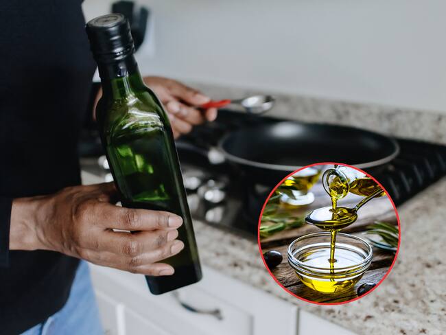 Persona cocinando con aceite de oliva extra virgen (Getty Images)