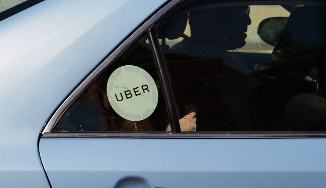 Vehículo de Uber con pasajeros. Foto: Getty