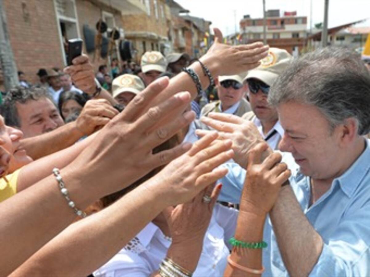 Santos se compromete a liberar a Colombia de “cadenas y grillos”