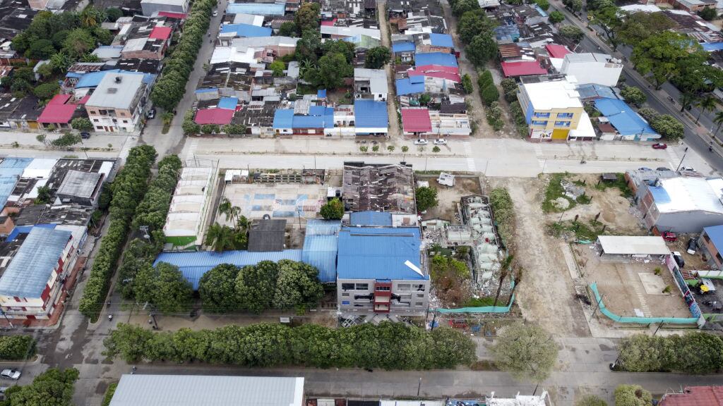 SARAVENA, COLOMBIA - FEBRUARY 19: An aerial view of the car bombing site near building of housing social organizations on January 19 (a month ago) marked an escalation of violence, local authorities have imposed a nighttime curfew and FARC dissidents have also banned anyone from moving around after 10:00 pm, in Saravena, Arauca, Colombia on February 19, 2022. The violence underscores the fragility of peace in the nation and the failure of the security response by the government of President IvÃ¡n Duque. (Photo by Juancho Torres/Anadolu Agency via Getty Images)