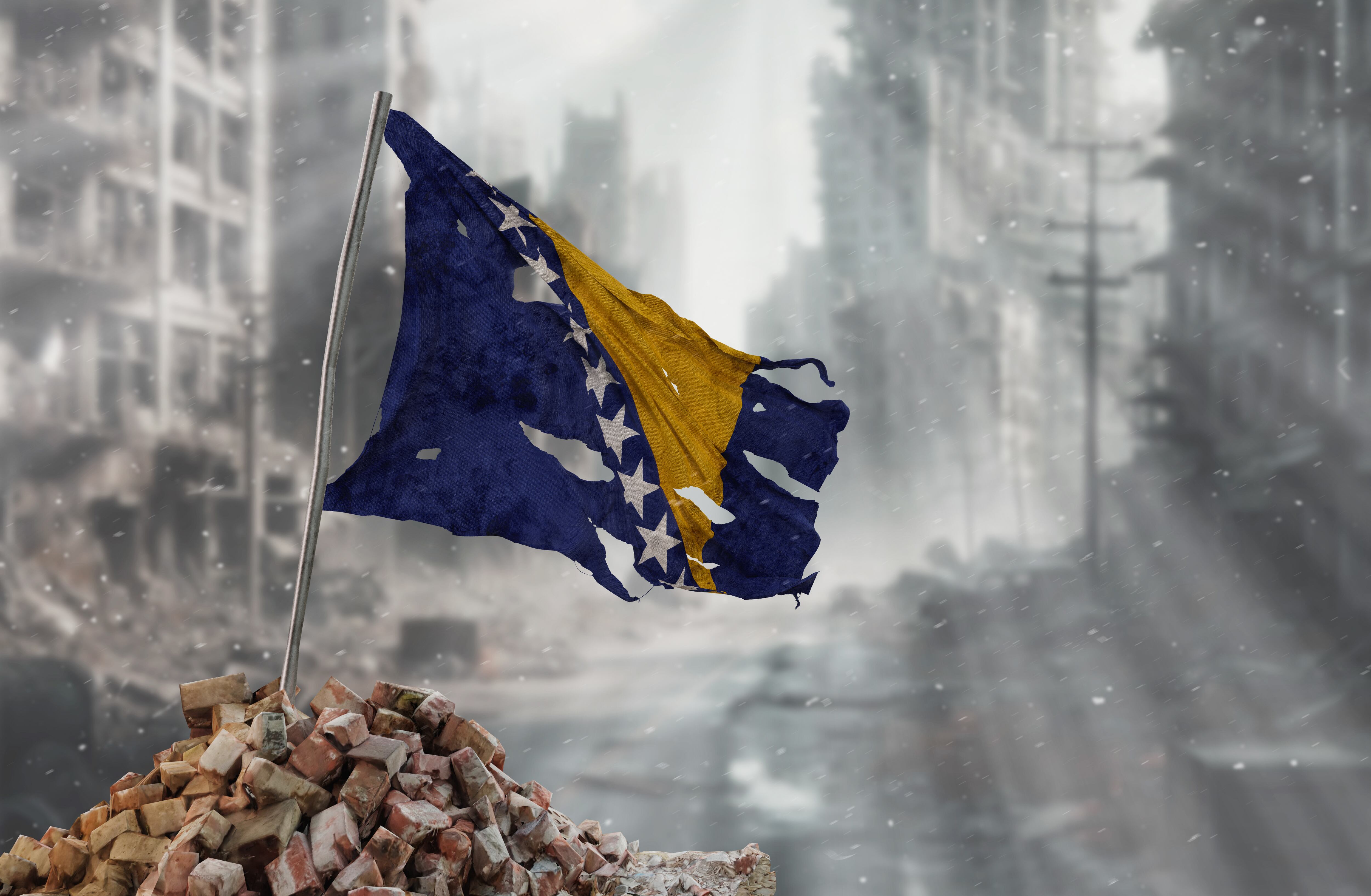 Dirty and torn Bosnia and Herzegovina flag, symbol of resistance and victory. A scene of war and devastation, the ruins of a city destroyed by conflicts. 3D Rendering.