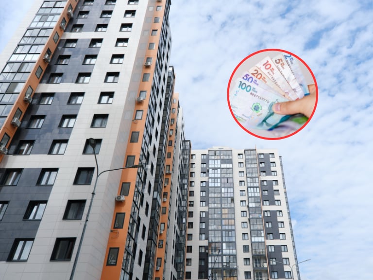 Edificios residenciales y al lado una persona con dinero colombiano (Fotos vía Getty Images)