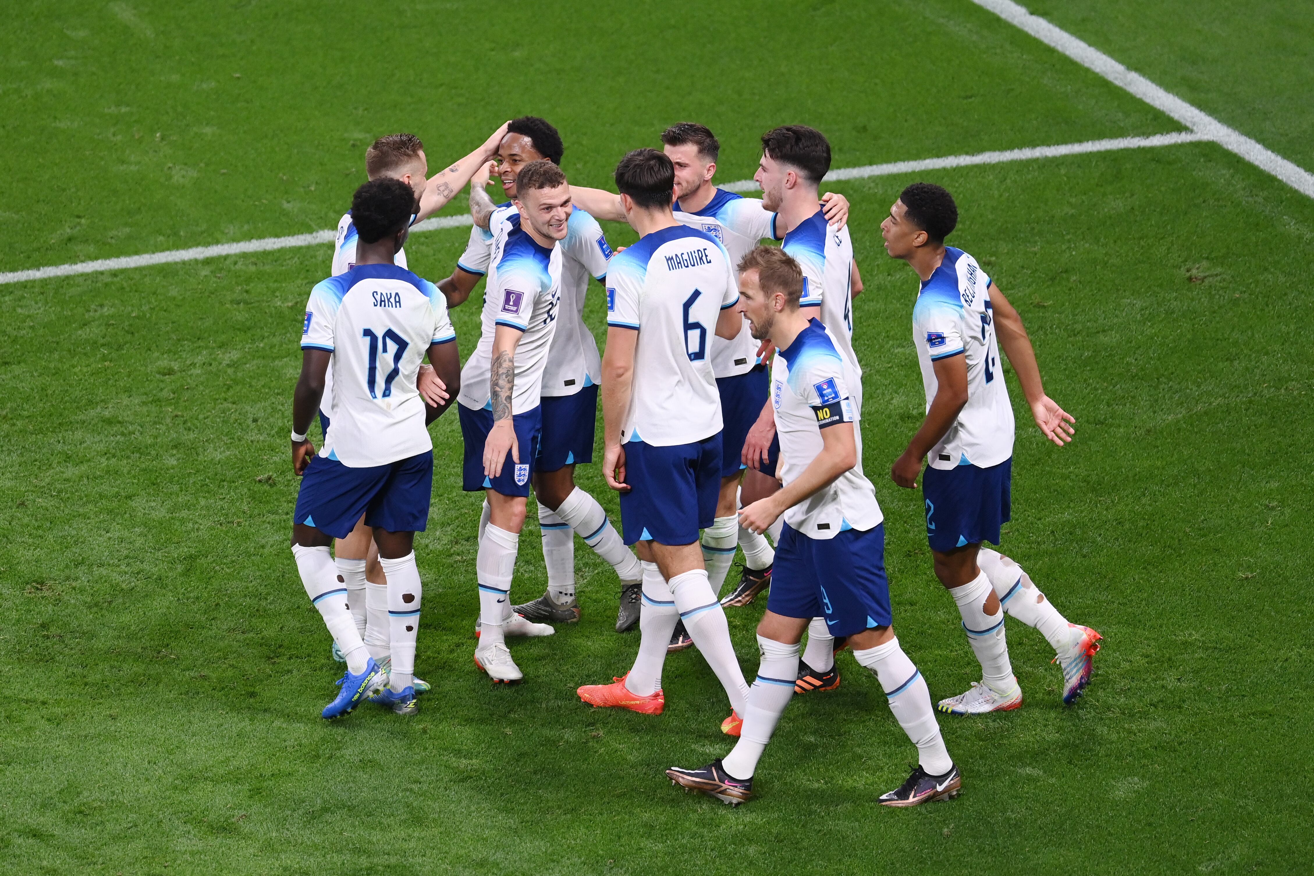 DOHA, QATAR - NOVEMBER 21: Raheem Sterling (3rd L) of England celebrates after scoring their team's third goal with their teammates during the FIFA World Cup Qatar 2022 Group B match between England and IR Iran at Khalifa International Stadium on November 21, 2022 in Doha, Qatar. (Photo by Laurence Griffiths/Getty Images)
