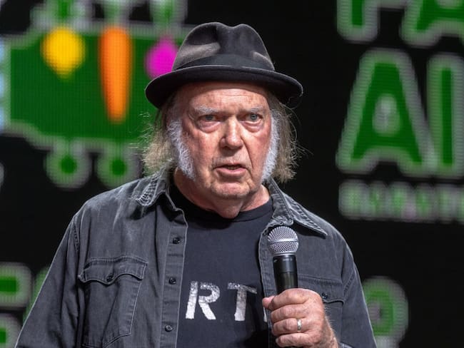SARATOGA SPRINGS, NEW YORK - SEPTEMBER 21: Neil Young on stage during Farm Aid 2024 at Saratoga Performing Arts Center on September 21, 2024 in Saratoga Springs, New York. (Photo by Gary Miller/Getty Images)