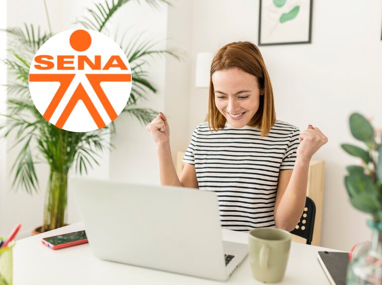 Mujer feliz tras una buena noticia en su computador (Getty Images)