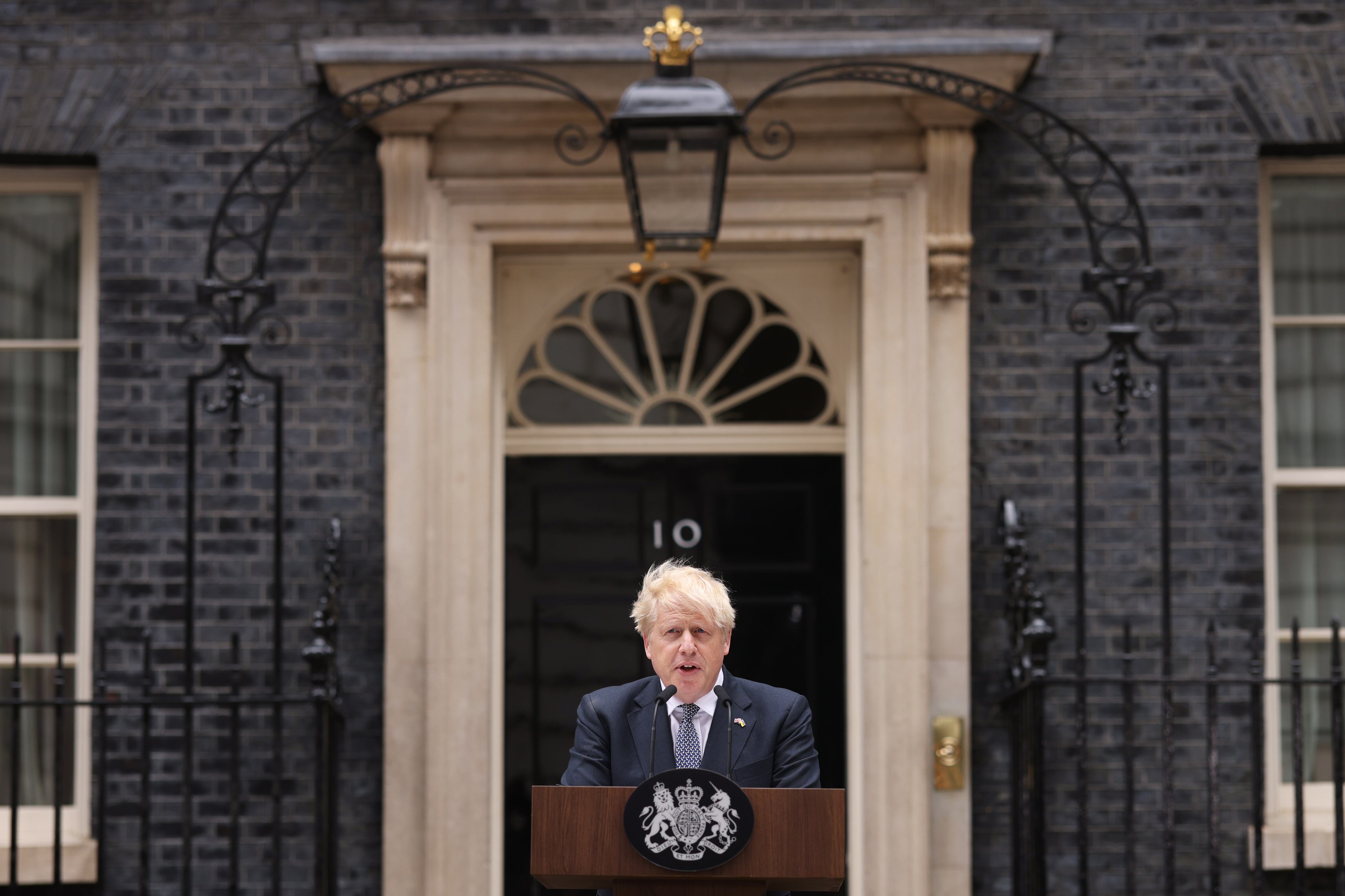 LONDON, ENGLAND - JULY 07: Prime Minister Boris Johnson addresses the nation as he announces his resignation outside 10 Downing Street, on July 7, 2022 in London, England. After a turbulent term in office, Boris Johnson will resign from his roles as Conservative Party Leader and Prime Minister today after coming under pressure from his party. Eton and Oxford-educated Alexander Boris de Pfeffel Johnson, MP for Uxbridge and South Ruislip, was elected as Prime Minister in the 2019 General Election.  (Photo by Dan Kitwood/Getty Images)