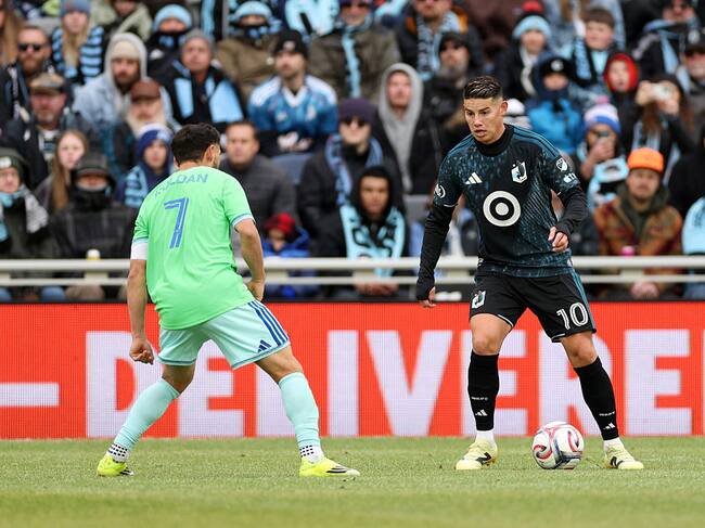 ST PAUL, MINNESOTA - MARCH 22: James Rodriguez #10 of Minnesota United FC controls the ball whilst under pressure from Cristian Roldan #7 of Seattle Sounders during the MLS match between Minnesota United FC and Seattle Sounders FC at Allianz Field on March 22, 2026 in St Paul, Minnesota. (Photo by David Berding/MLS via Getty Images)