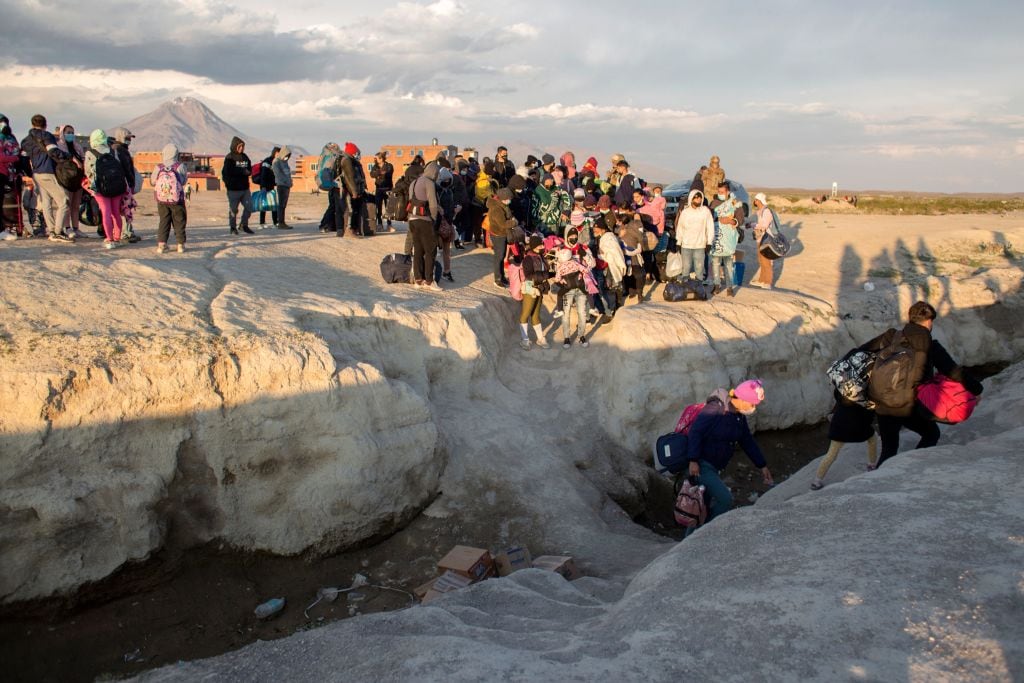 Migrantes frontera Chile. (Photo by DIEGO REYES/AFP via Getty Images)