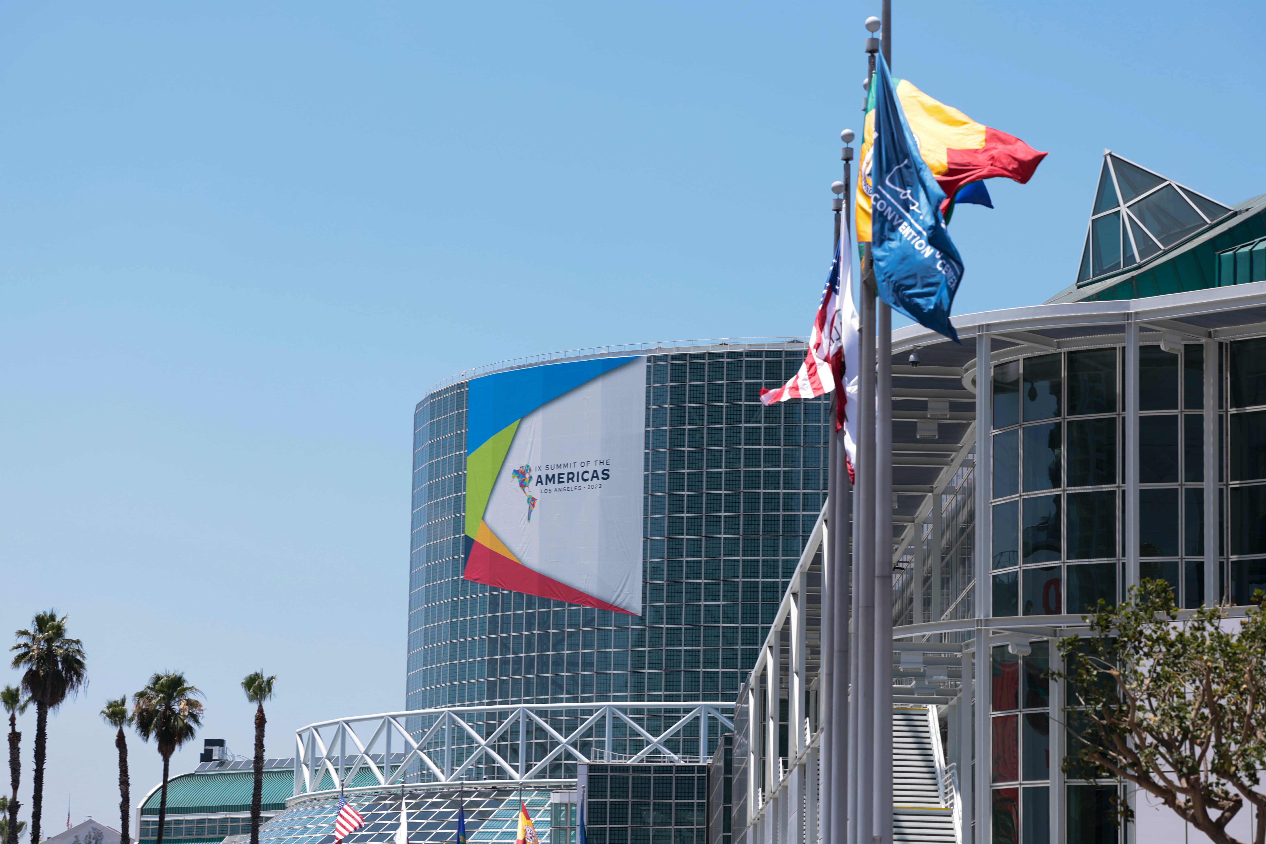 LOS ANGELES, CALIFORNIA - JUNE 06: A banner for the Ninth Summit of the Americas hangs on the Los Angeles Convention Center on June 06, 2022 in Los Angeles, California. Leaders from North, Central and South America will travel to Los Angeles for the summit to discuss issues such as trade and migration. The United States is hosting the summit for the first time since 1994, when it took place in Miami. (Photo by Anna Moneymaker/Getty Images)