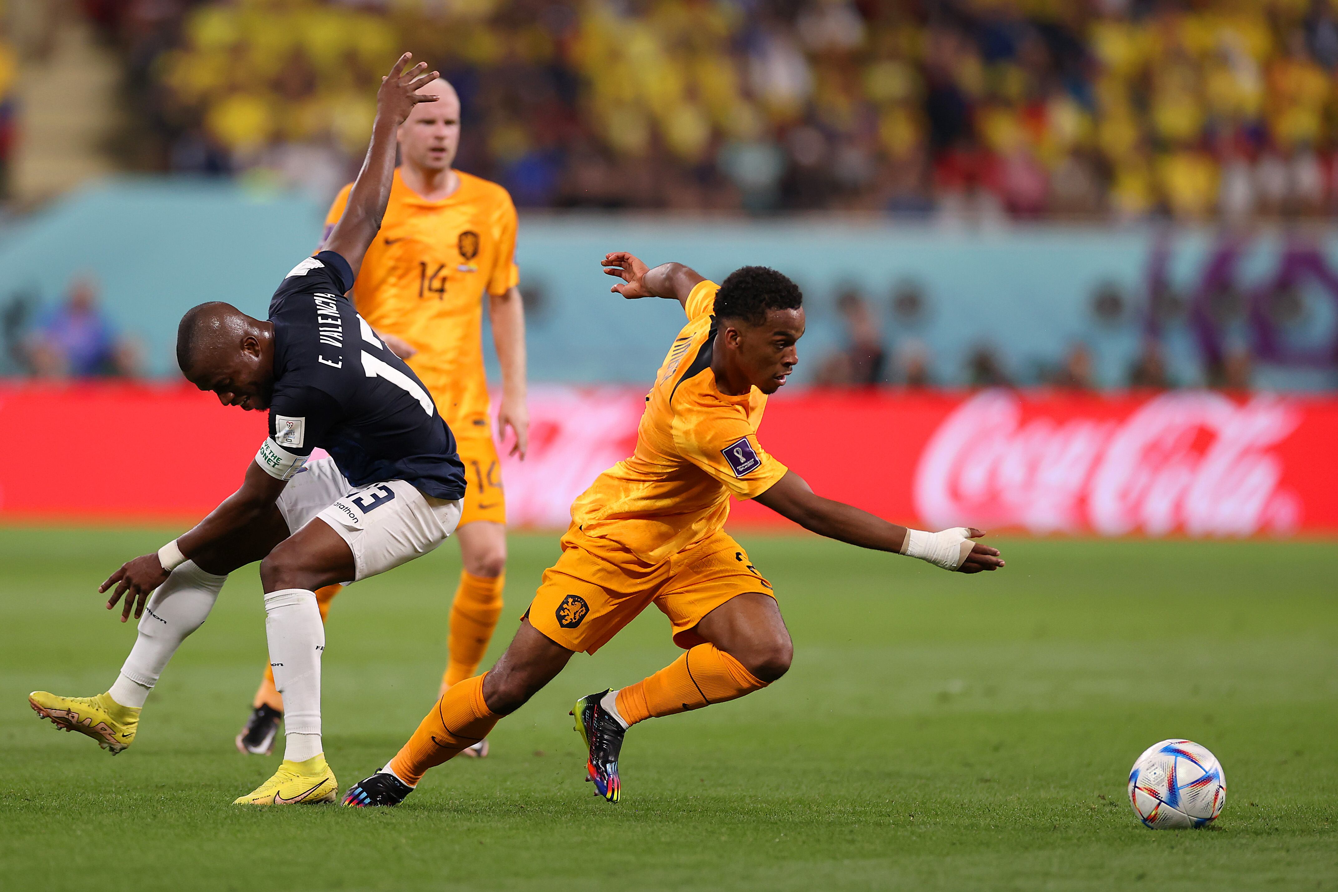 DOHA, QATAR - NOVEMBER 25: Jurrien Timber of Netherlands controls the ball against Enner Valencia of Ecuador during the FIFA World Cup Qatar 2022 Group A match between Netherlands and Ecuador at Khalifa International Stadium on November 25, 2022 in Doha, Qatar. (Photo by Michael Steele/Getty Images)