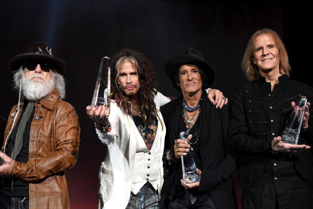 LOS ANGELES, CALIFORNIA - JANUARY 24: Aerosmith was recognized tonight as the 2020 Person of the Year at MusiCares. The MusiCares Person of the Year tribute is one of the most prestigious events held during GRAMMY Week. A tribute concert was held in the band’s honor and included performances by: Nuno Bettencourt, Jonas Brothers, Cheap Trick, Gary Clark Jr., Alice Cooper, Gavin Degraw, Melissa Etheridge, Foo Fighters, Luis Fonsi, Sammy Hagar, H.E.R., Jessie J, Kesha, Emily King, John Legend, Ashley McBryde, LeAnn Rimes, and Yola. Proceeds from the annual Person of the Year tribute — celebrating its 30th anniversary — provide essential support for MusiCares (www.musicares.org), a charity founded by the Recording Academy® that ensures music people have a place to turn in times of financial, medical and personal need. (Photo by Kevin Mazur/Getty Images for The Recording Academy)