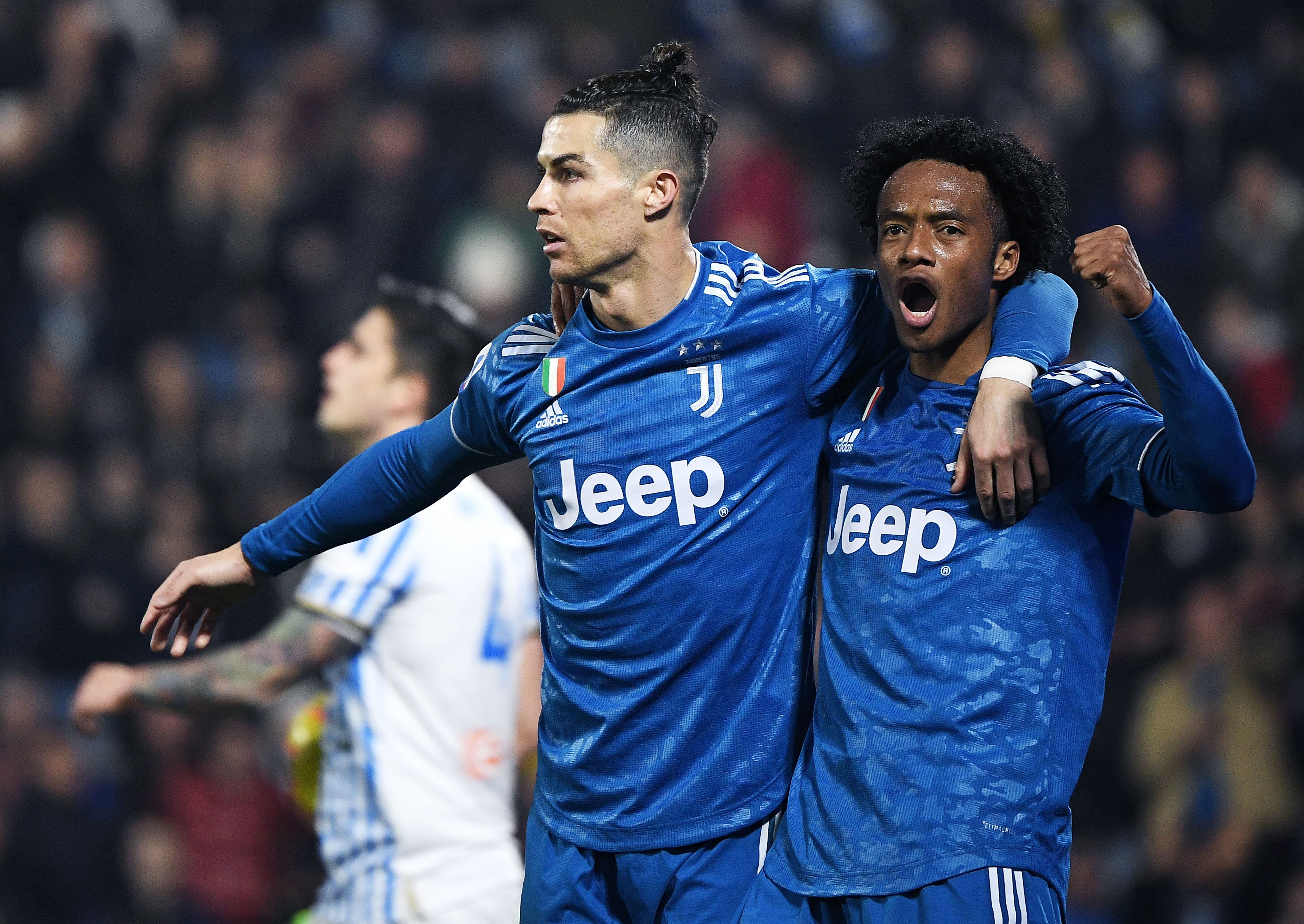 Juan Guillermo Cuadrado y Cristiano Ronaldo ya compartieron equipo en la Juventus durante tres temporadas. (Photo by Isabella BONOTTO / AFP) (Photo by ISABELLA BONOTTO/AFP via Getty Images)