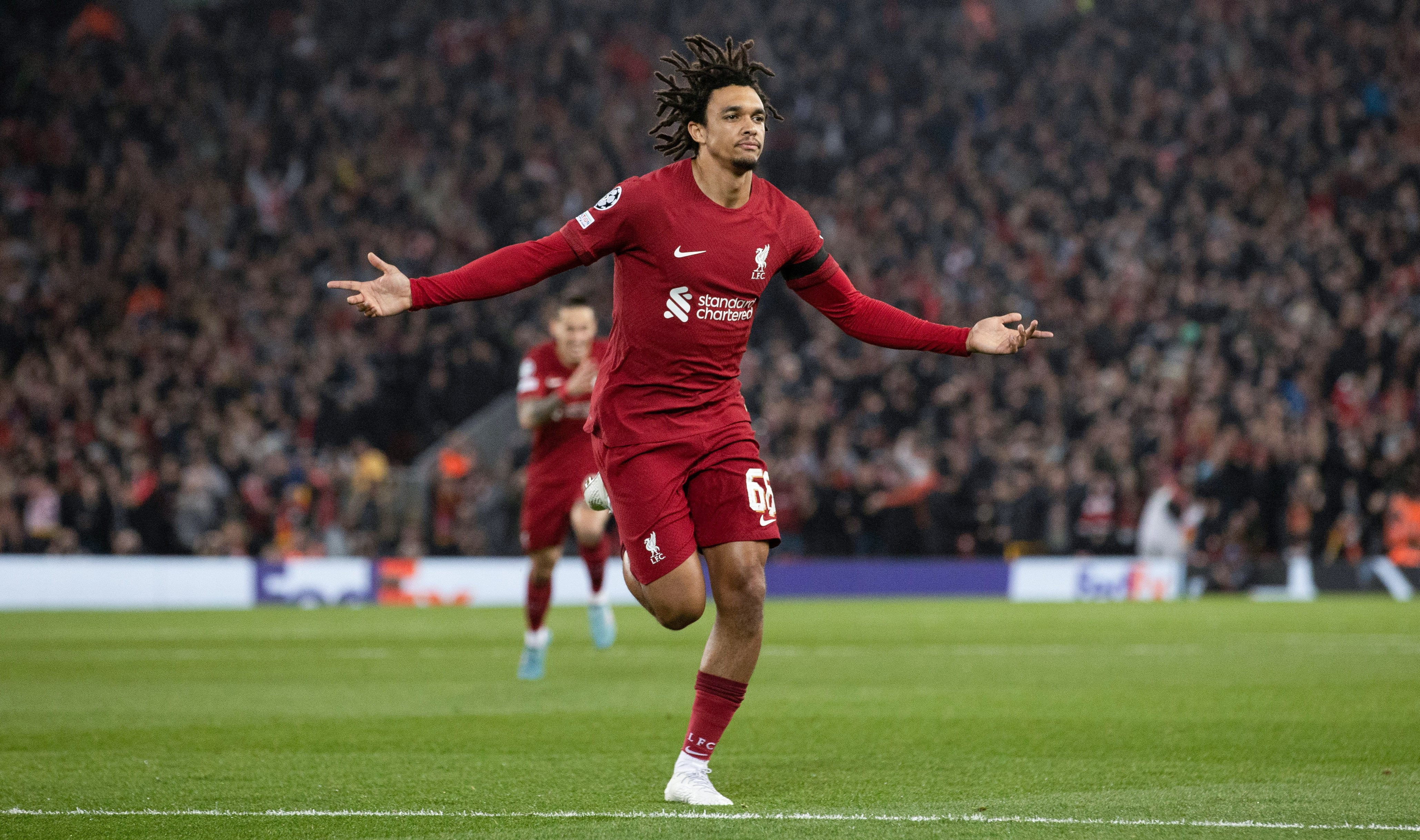 LIVERPOOL, ENGLAND - OCTOBER 04: Liverpool's Trent Alexander-Arnold celebrates scoring a free kick to make it 1-0 during a UEFA Champions League match between Liverpool and Rangers at Anfield, on October 04, 2022, in Liverpool, England. (Photo by Craig Williamson/SNS Group via Getty Images)