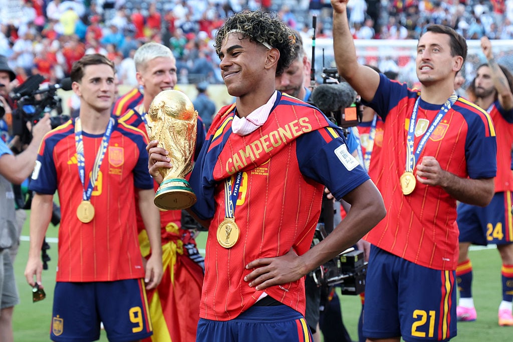 EAST RUTHERFORD, NEW JERSEY - JULY 19: Lamine Yamal #19 of Spain holds the trophy following the FIFA World Cup 2026 Final football match between Spain and Argentina at New York New Jersey Stadium on July 19, 2026 in East Rutherford, New Jersey. (Photo by Jean Catuffe/Getty Images)