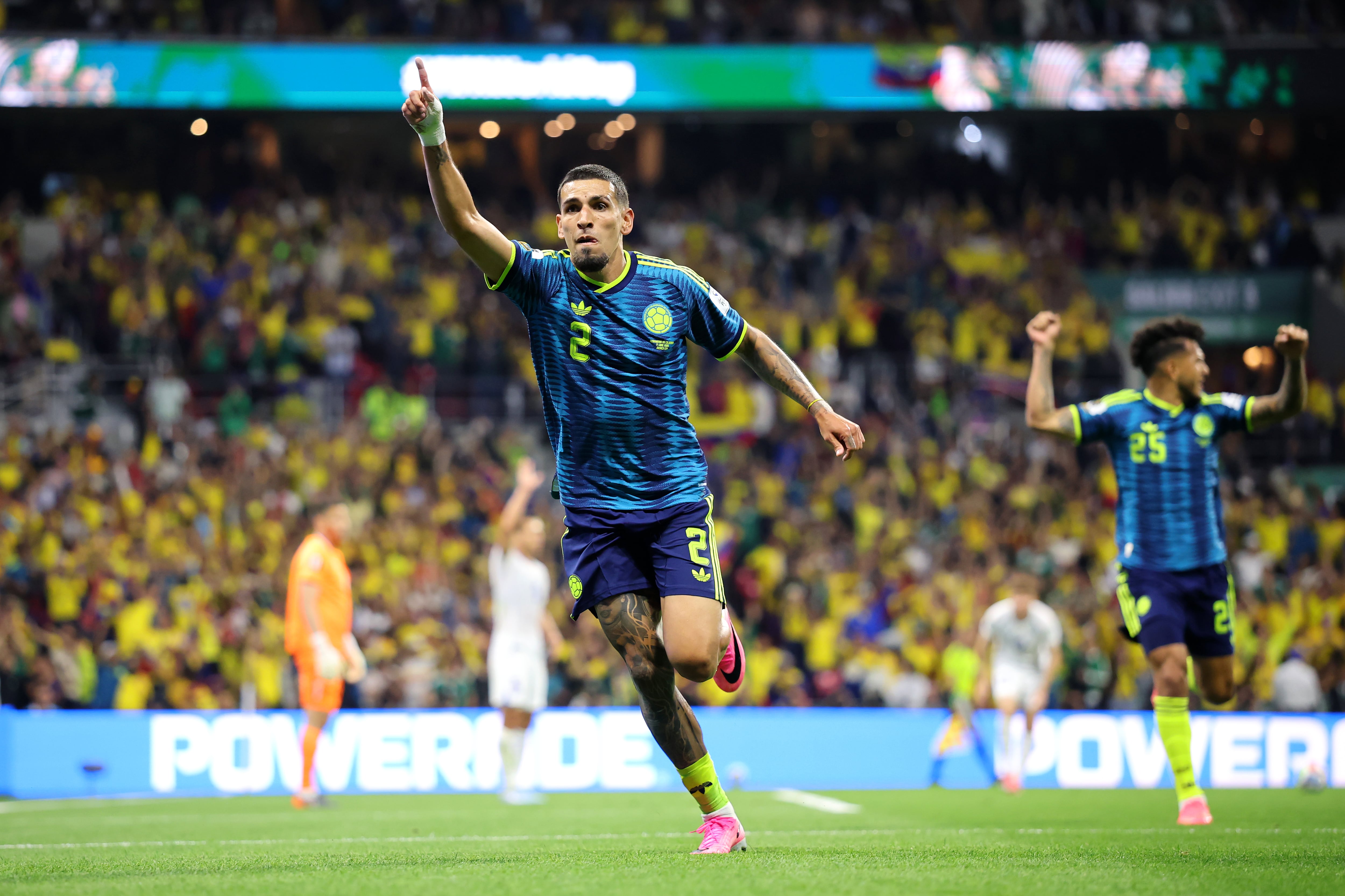 MEXICO CITY, MEXICO - JUNE 17: Daniel Munoz #2 of Colombia celebrates scoring his team's first goal during the FIFA World Cup 2026 Group K match between Uzbekistan and Colombia at Mexico City Stadium on June 17, 2026 in Mexico City, Mexico. (Photo by Hector Vivas - FIFA/FIFA via Getty Images)