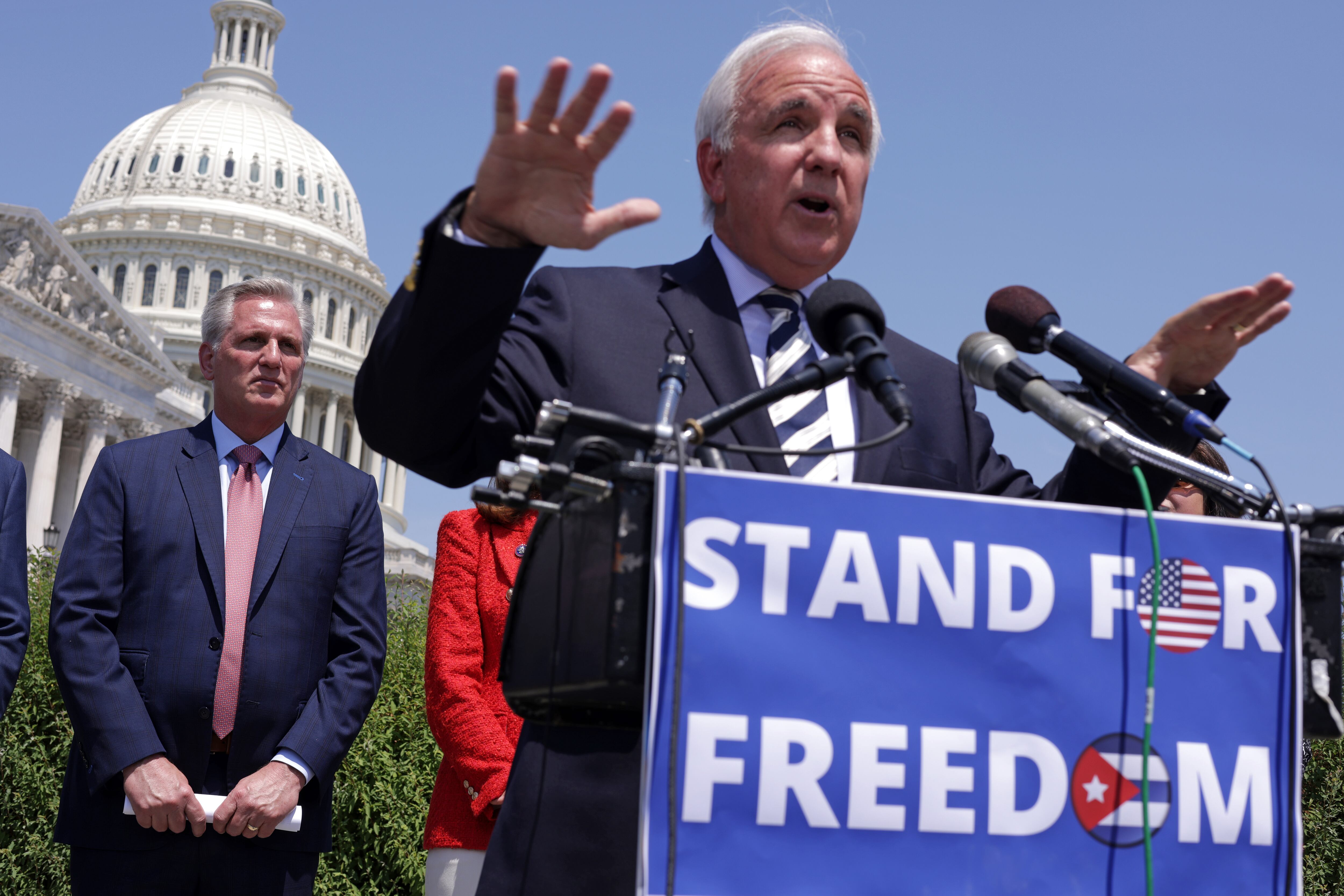 WASHINGTON, DC - MAY 20:  U.S. Rep. Carlos Gimenez (R-FL) (R) speaks as House Minority Leader Rep. Kevin McCarthy (R-CA) listens during McCarthy’s weekly news conference outside the U.S. Capitol May 20, 2021 in Washington, DC. McCarthy recognized Cuban Independence Day during the news conference. (Photo by Alex Wong/Getty Images)
