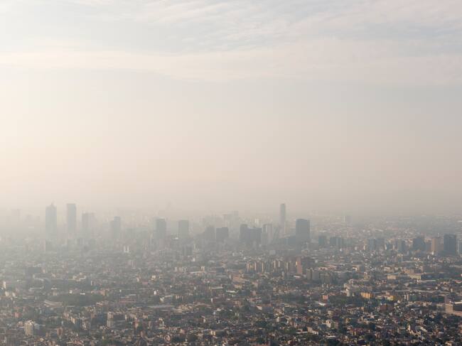 Aerial view of skyline and smog Mexico City, Mexico