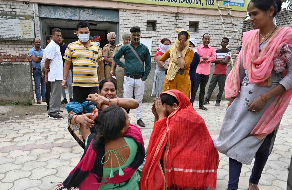 LUDHIANA, INDIA  APRIL 30: Aggrieved family members of the deceased of gas leak incident at Civil Hospital on April 30, 2023 in Ludhiana, India. Eleven people including two children are feared dead and many others are feared trapped inside a factory on Sua Road near Sherpur Chowk in Punjab's Ludhiana after a gas leak on Sunday after it was first noticed first around 7:15am. According to initial reports, the gas leaked from a block with different establishments including - a cold drink store, a grocery store and a medical clinic. (Photo by Gurpreet Singh/Hindustan Times via Getty Images)