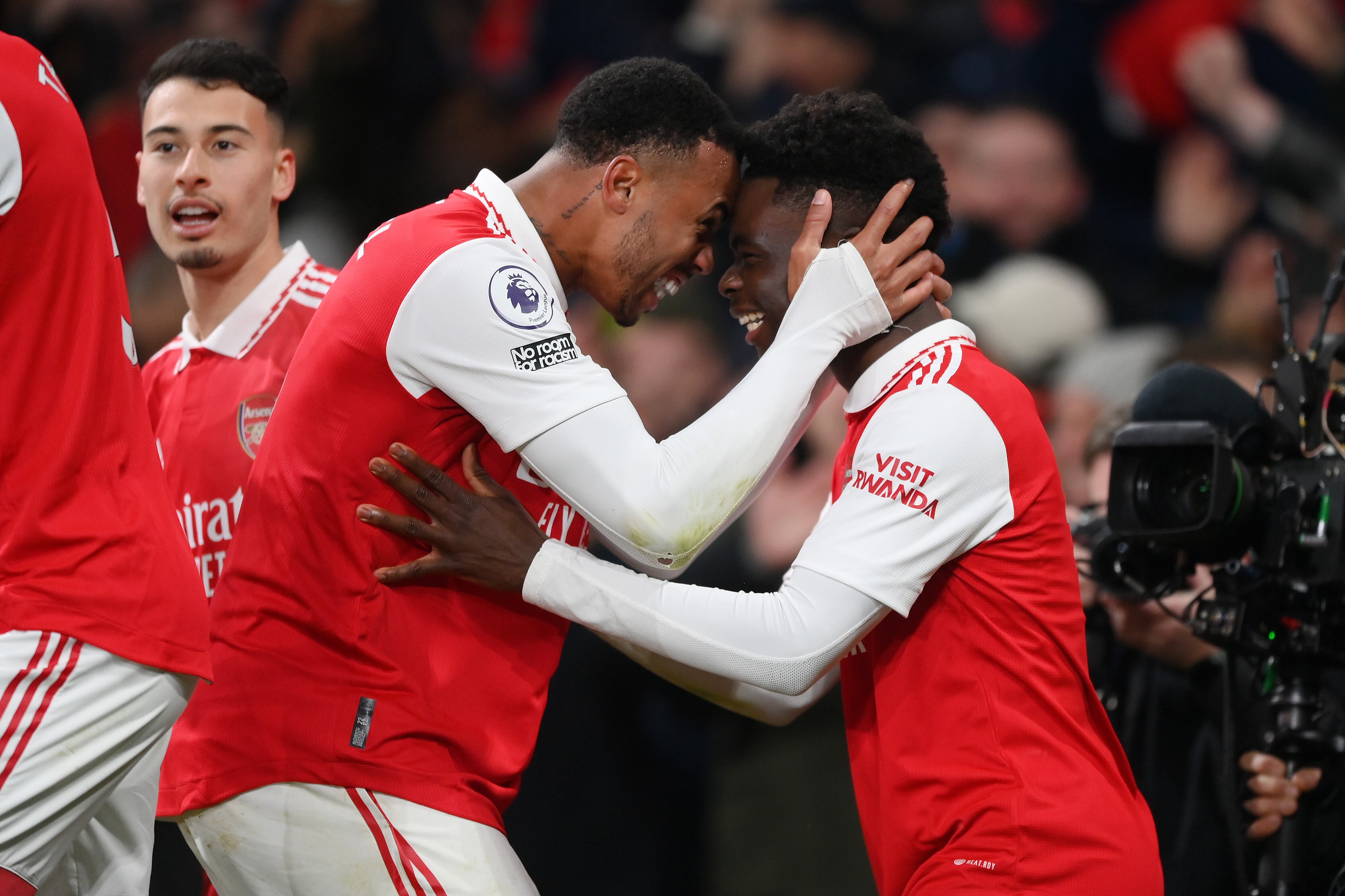 LONDON, ENGLAND - JANUARY 22: Bukayo Saka celebrates with Gabriel of Arsenal after scoring the team's second goal during the Premier League match between Arsenal FC and Manchester United at Emirates Stadium on January 22, 2023 in London, England. (Photo by Shaun Botterill/Getty Images)