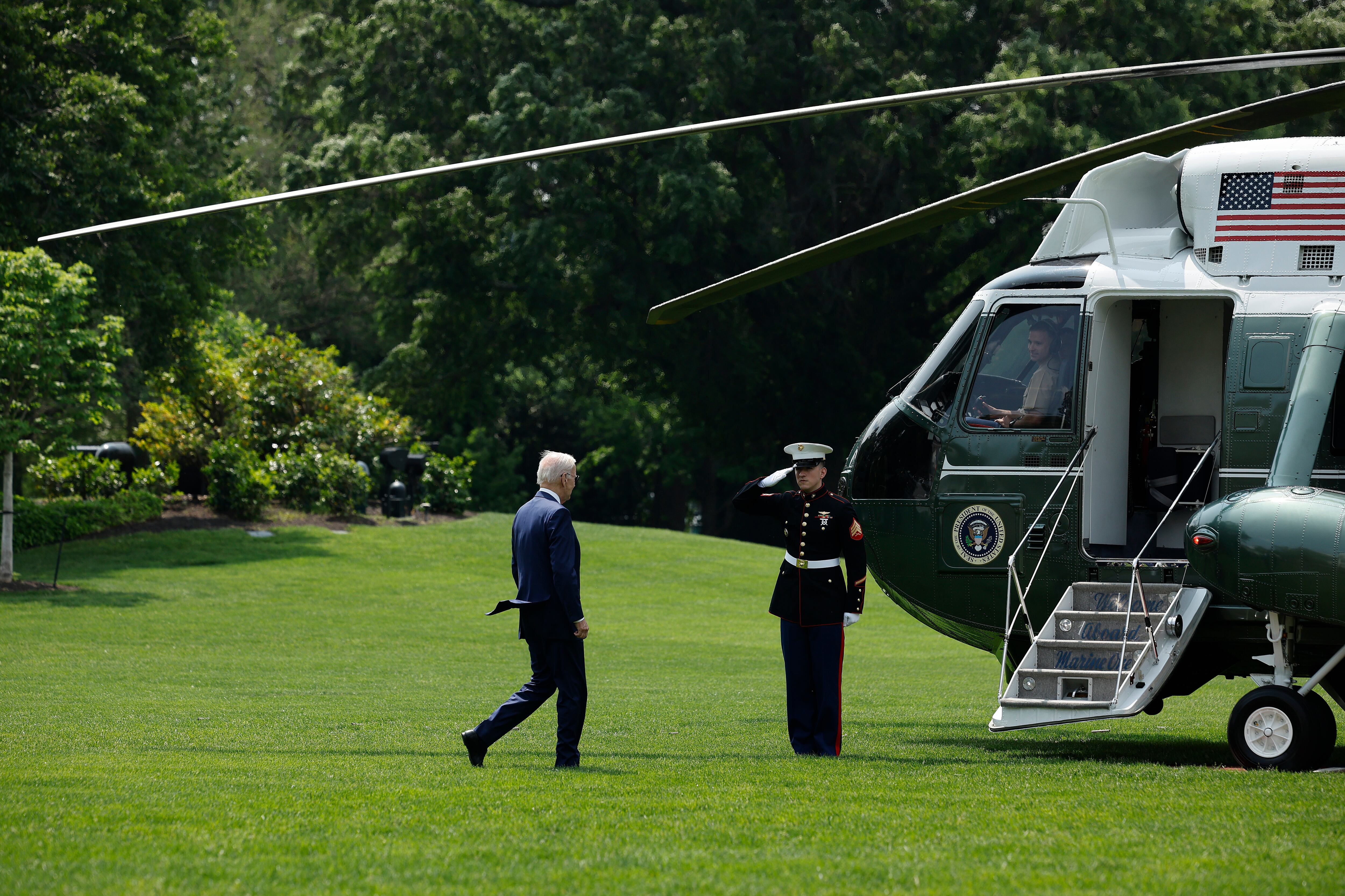 WASHINGTON, DC - MAY 17: U.S. President Joe Biden walks across the South Lawn before boarding Marine One and departoing the White House on May 17, 2023 in Washington, DC. Biden is traveling to Japan for the G7 summit but will cut his travel plans short to return to the U.S. Sunday to continue the negotiations over the federal debt limit. (Photo by Chip Somodevilla/Getty Images)