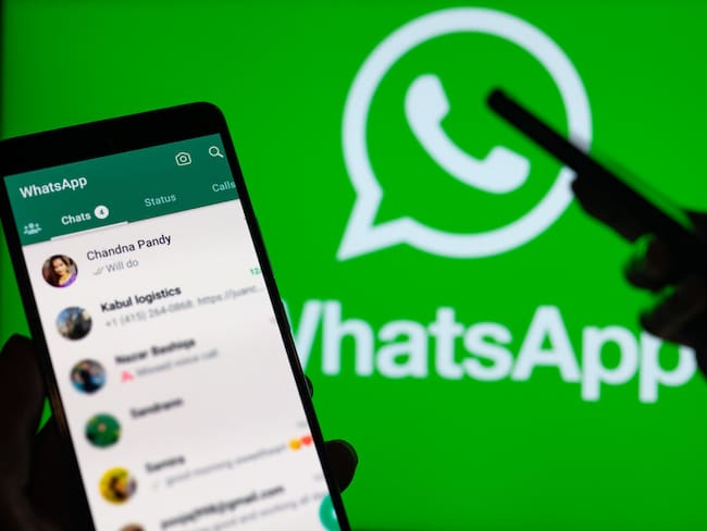 WhatsApp mobile app displayed on phone (Photo illustration by Jonathan Raa/NurPhoto via Getty Images)